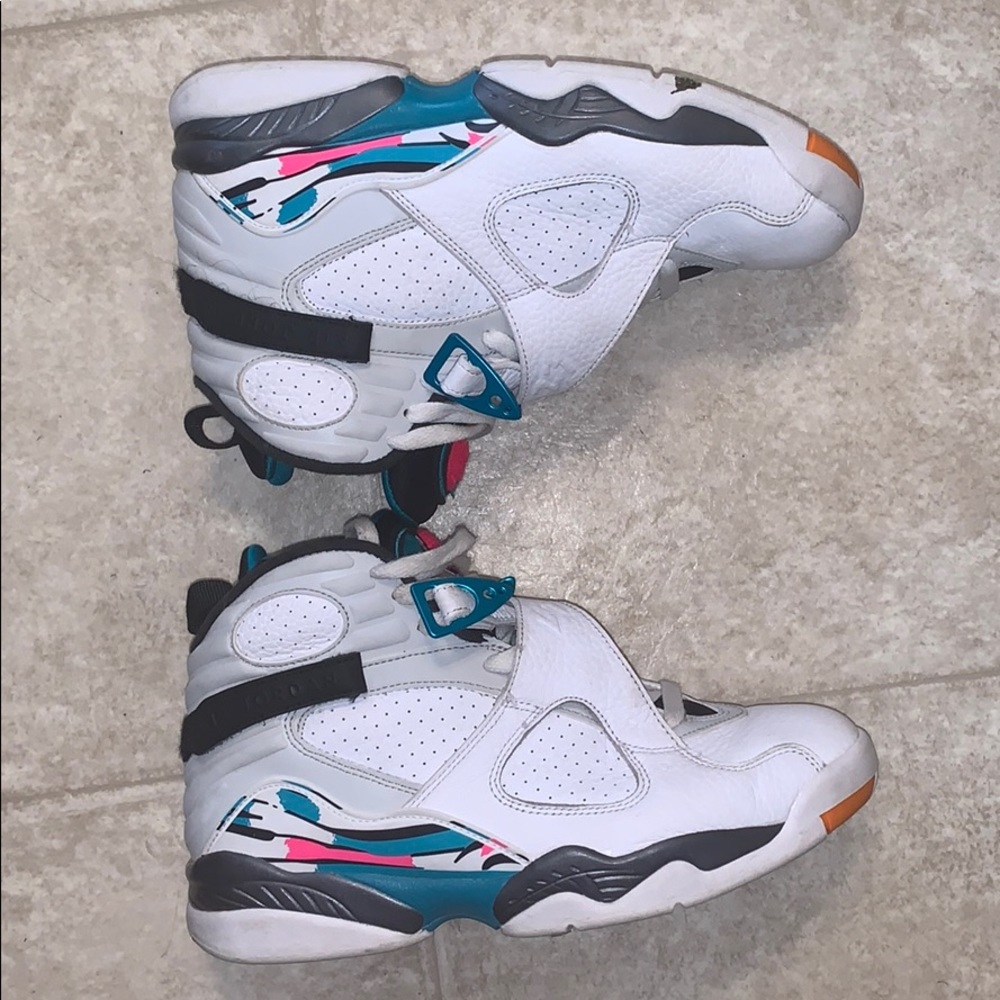 White, hot pink and turquoise Jordans